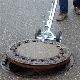 Manhole cover lifting devices with leverage