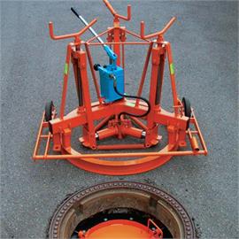 Manhole frame lifter