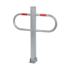 Passage and parking lot barrier reversible with profile cylinder lock