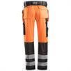 Kõrge visiiriga tööpüksid, mille taskud on kõrgvisiirilised klassi 2 oranžid. | Bild 2